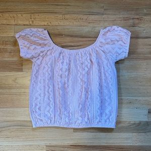 Express blush pink off the shoulder crop top.